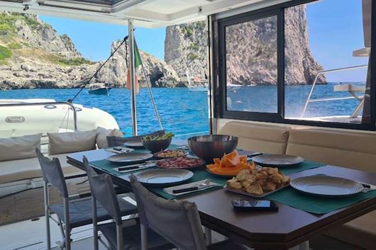 Immagine di 2025 | Ponte 2 Giugno | Procida | isole Flegree e Costiera Amalfitana | Crociera in Catamarano |